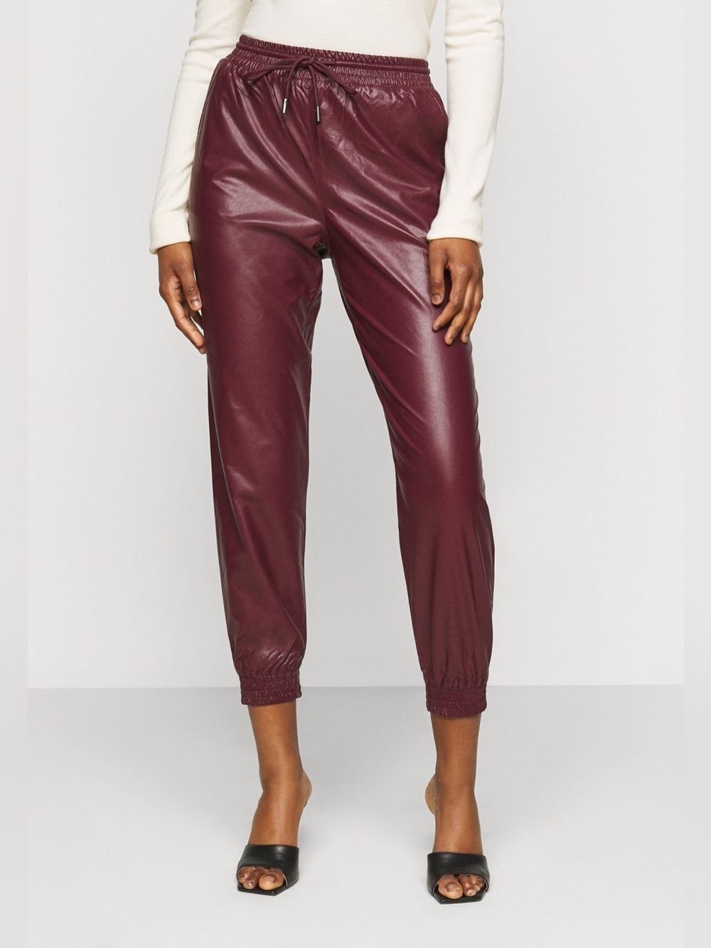 Women’s Faux Leather Joggers in a shiny burgundy  NWT